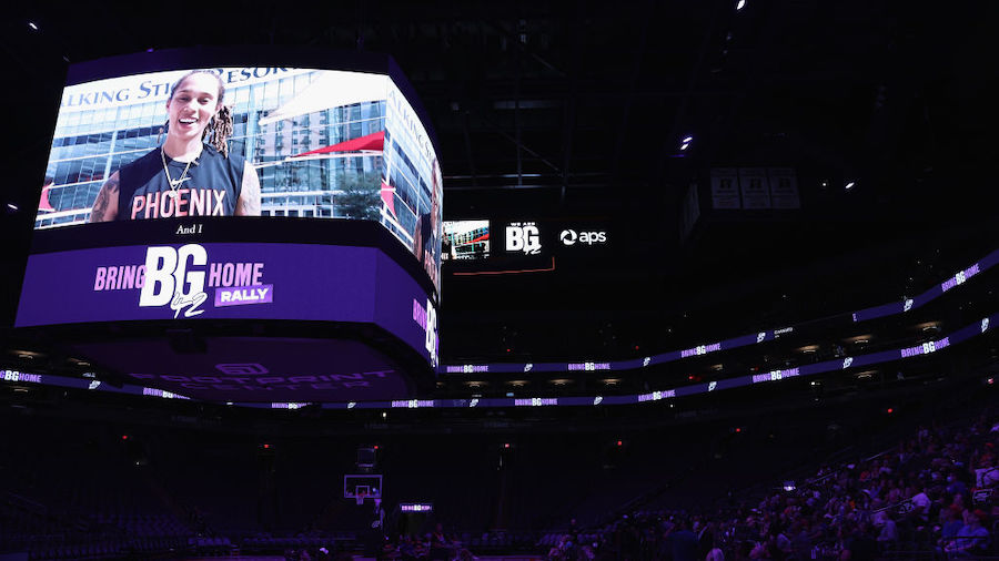 The video board displays past interviews with Brittney Griner during a rally to support the release...