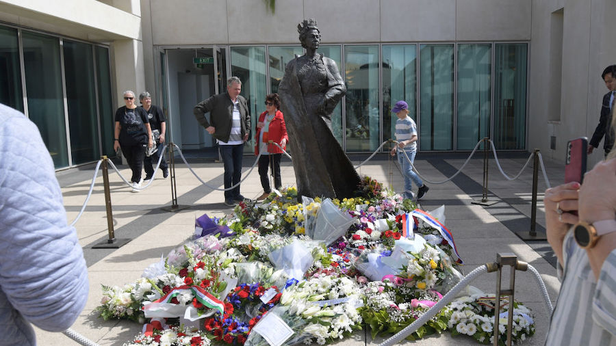 Wreaths are placed around the statue of Queen Elizabeth II at the Australian Parliament House on Se...