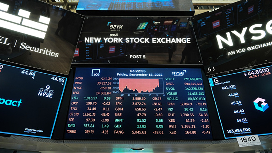 NEW YORK, NEW YORK - SEPTEMBER 16: A board displays market activity on the floor of the New York St...