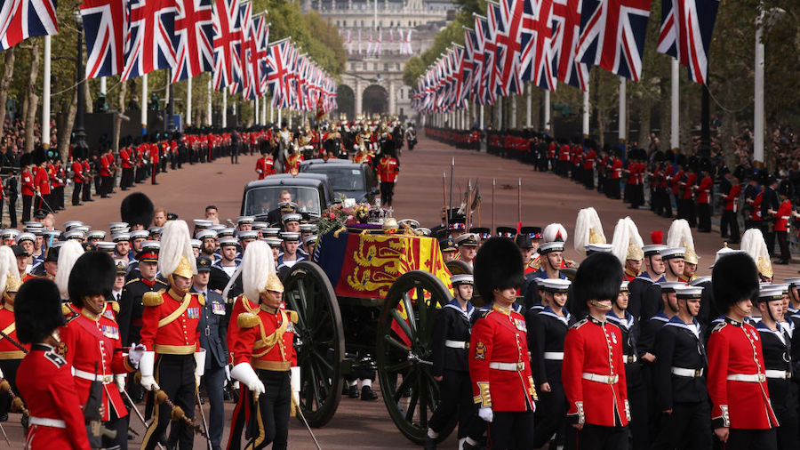 The Queen's funeral cortege borne on the State Gun Carriage of the Royal Navy travels along The Mal...