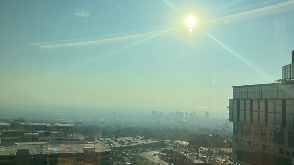 Smoky skies in the Salt Lake valley seen from the Huntsman Center. (Photo by Alexis Williams)...