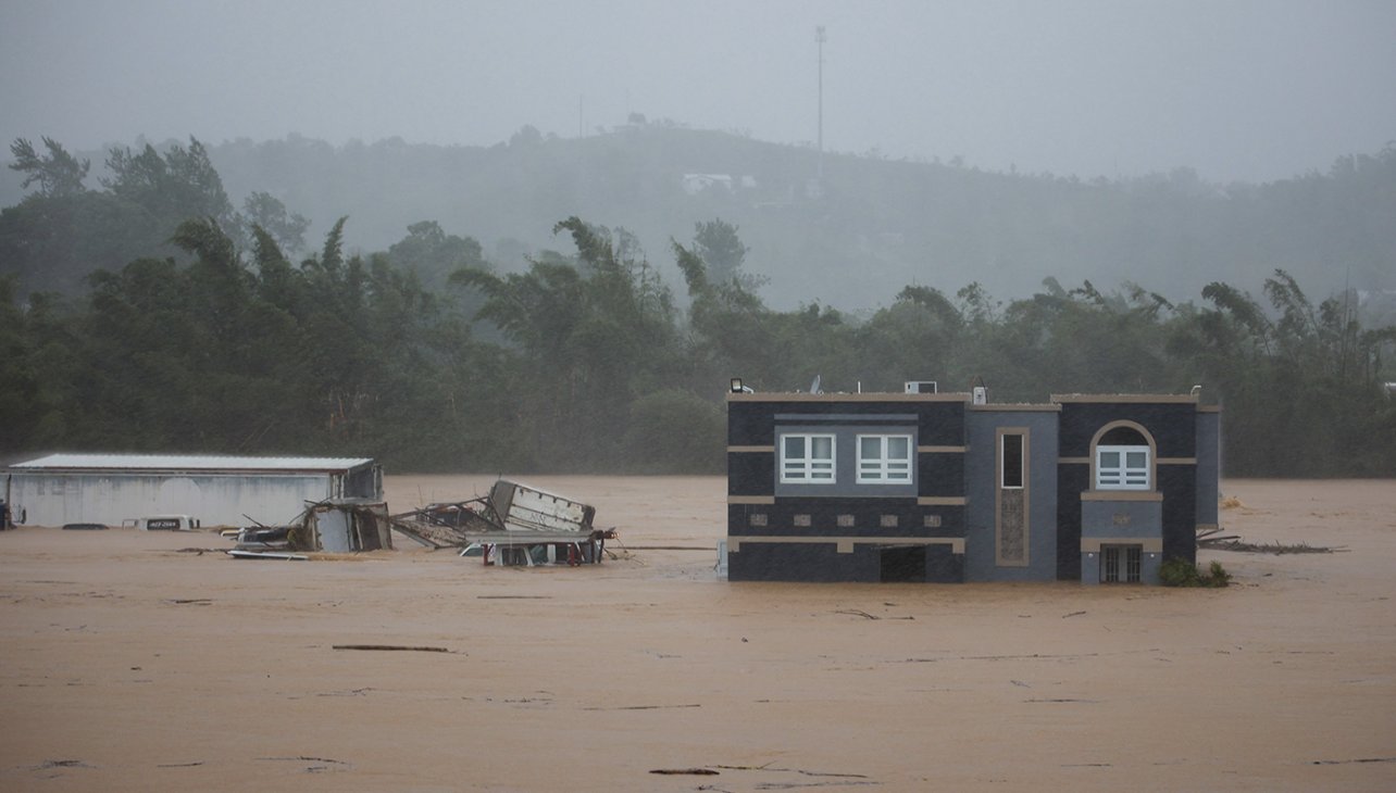 A home is submerged in floodwaters caused by Hurricane Fiona in Cayey, Puerto Rico on September 18....