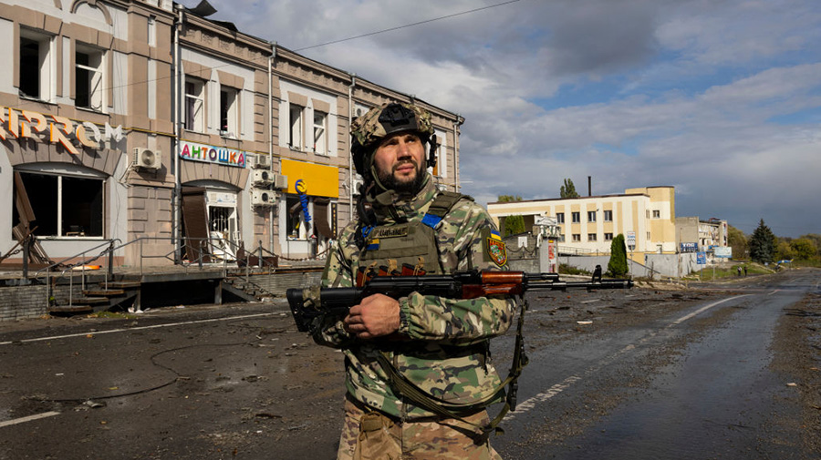 KUPIANSK, UKRAINE - SEPTEMBER 24: Kraken Special Forces soldier Igor Shpatenko patrols the empty st...