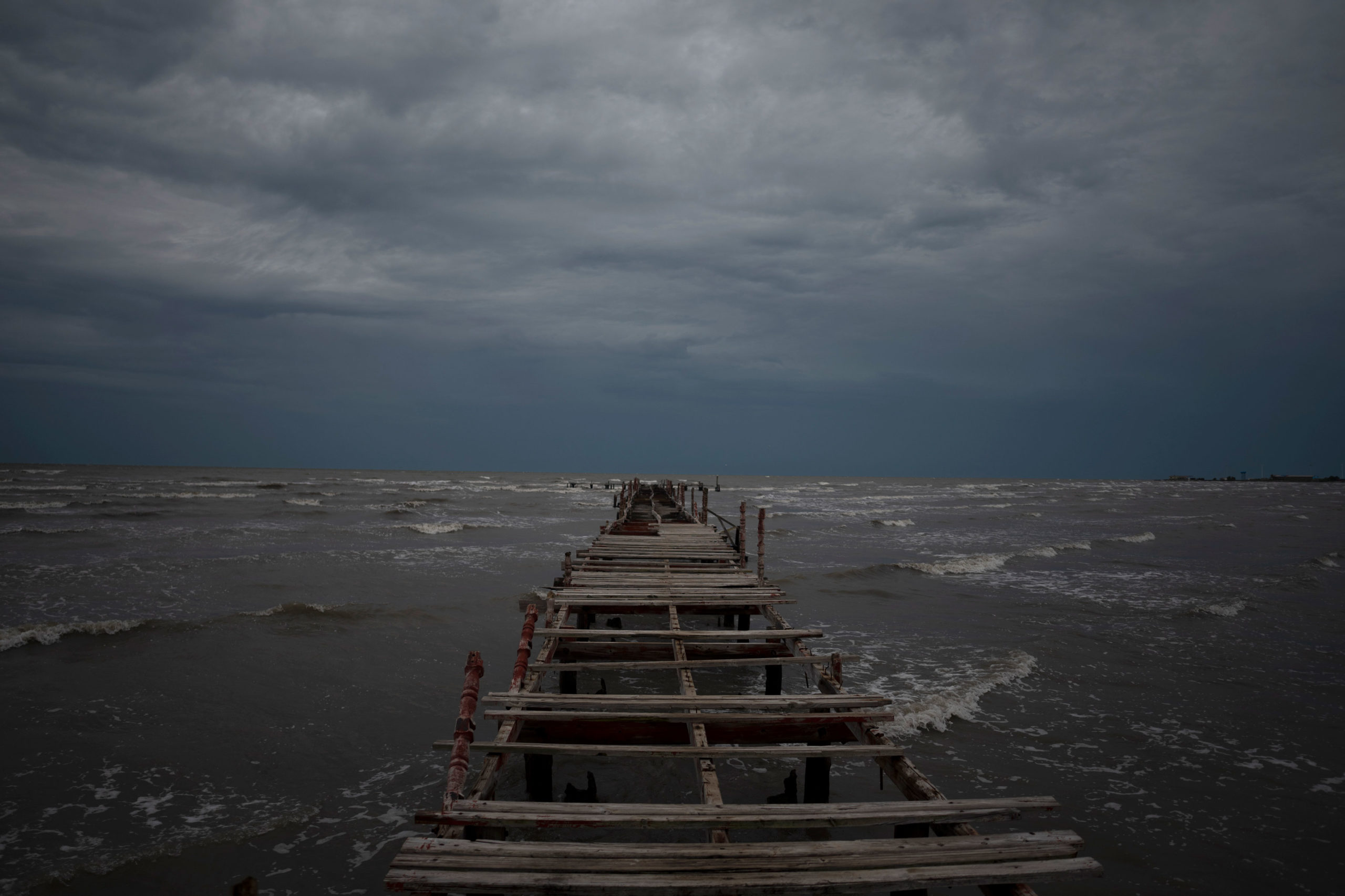 Waves kick up under a dark sky along the shore of Batabano, Cuba, Monday, Sept. 26, 2022. Hurricane...