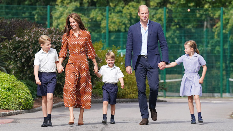 The Duke and Duchess of Cambridge walk into Lambrook School alongside Prince George, 9, (left) Prin...