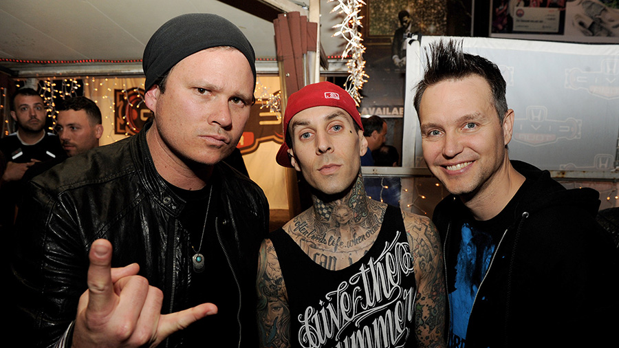 Tom DeLonge, Travis Barker and Mark Hoppus of Blink-182 in 2011. Blink-182 is reuniting with Tom De...