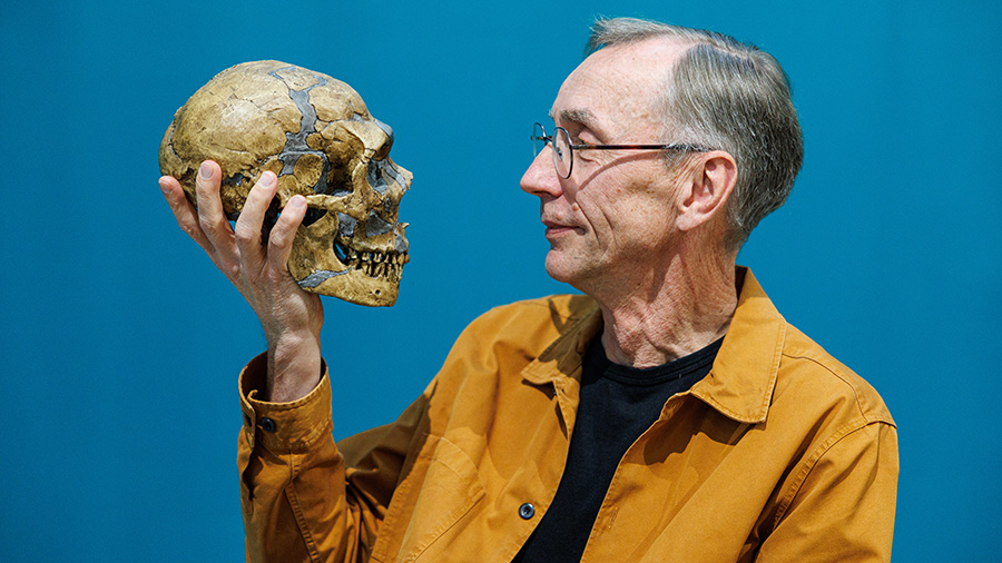 Svante Paabo, Director of the Max Planck Institute for Evolutionary Anthropology, with a model of a...