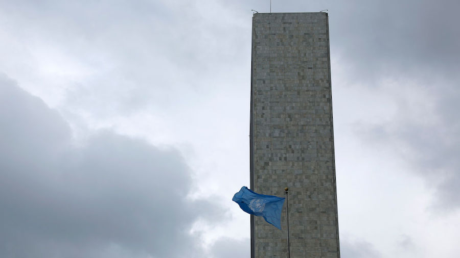 The United Nations (U.N.) flag flies outside the U.N. Headquarters on September 22, 2022 in New Yor...