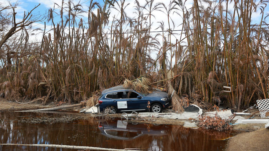 A destroyed vehicle lays among debris after Hurricane Ian passed through the area on October 08, 20...