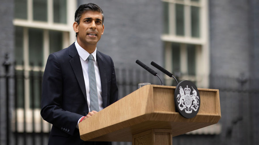 British Prime Minister Rishi Sunak makes a statement after taking office outside Number 10 in Downi...
