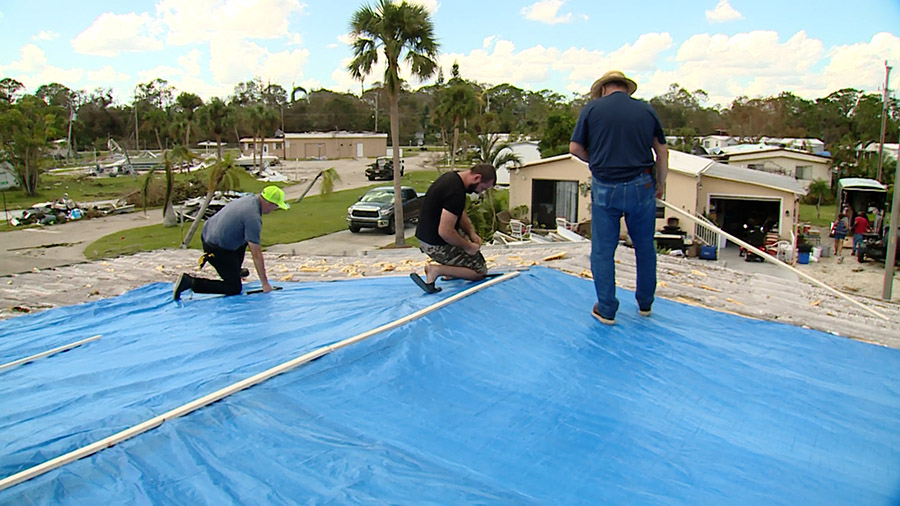 Jesus Christ of Latter-day Saints volunteers help clean up and repair the aftermath of Hurricane Ia...