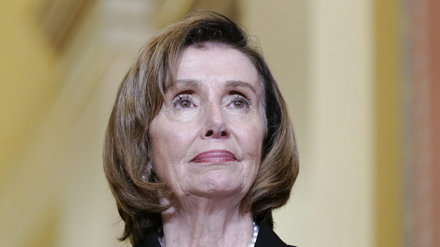 House Speaker Nancy Pelosi, seen here on October 25, says that while her husband, Paul, continues t...