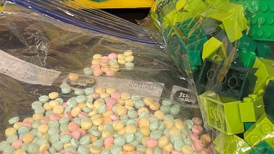 Authorities found 15,000 rainbow fentanyl pills in a Lego box in the largest seizure of the drug in...