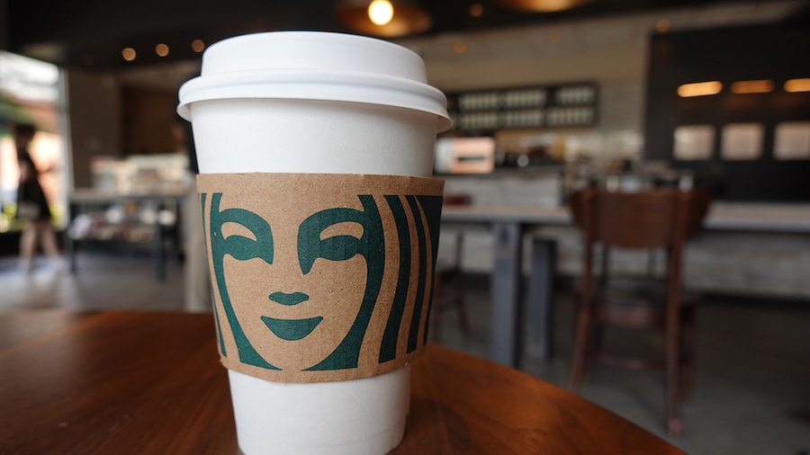 Starbucks customers can now earn Delta SkyMiles. (Joe Raedle/Getty Images via CNN)...
