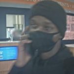 The black male suspect who allegedly robbed a credit union customer on Sept. 9. (Federal Bureau of Investigation) 