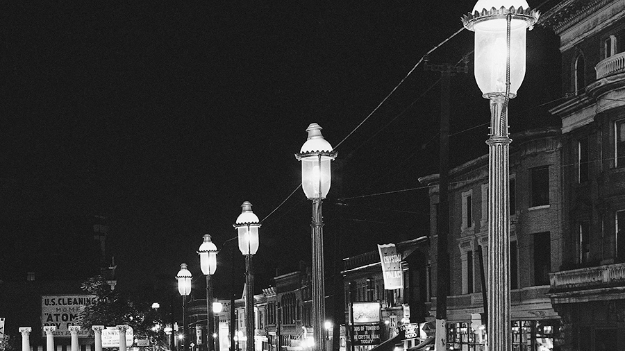 FILE - Gas lamps illuminate St. Louis' Gaslight Square on April 2, 1962. "Gaslighting" — mind man...