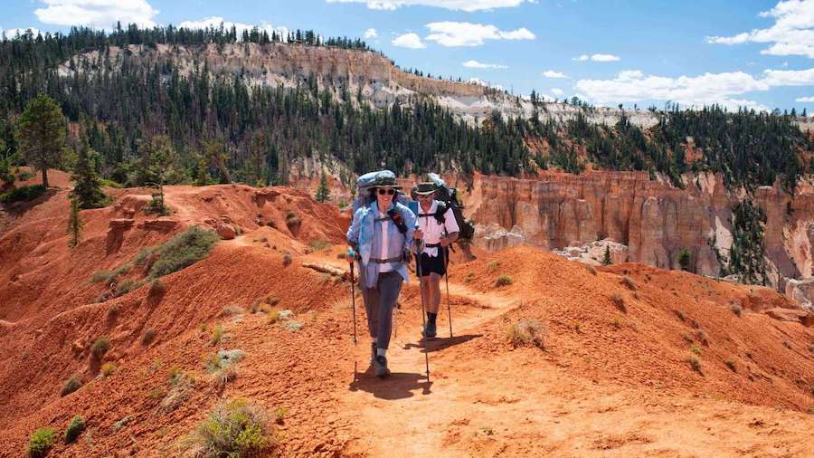 Backpackers in Bryce Canyon backcountry. The park announced Tuesday it is moving its reservation sy...