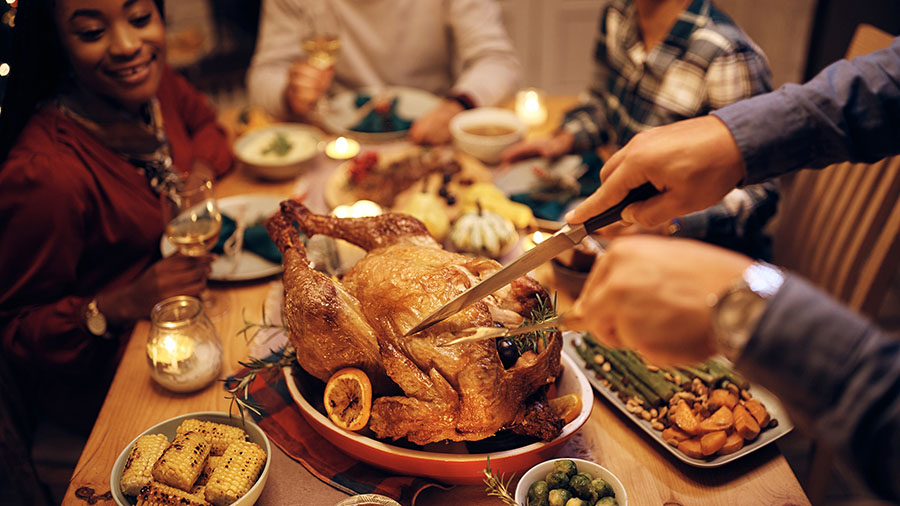 Don't blame the turkey for your post-meal sleepiness, experts say. (Adobe Stock)...