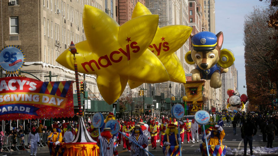 NEW YORK, NY - NOVEMBER 25: Crowds watch as Macys stars and Paw Patrol's Chase balloons float past ...