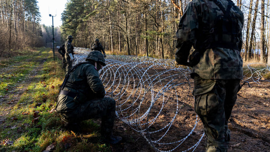 Polish army installing concertina wire at Poland's border with the Russian exclave of Kaliningrad o...