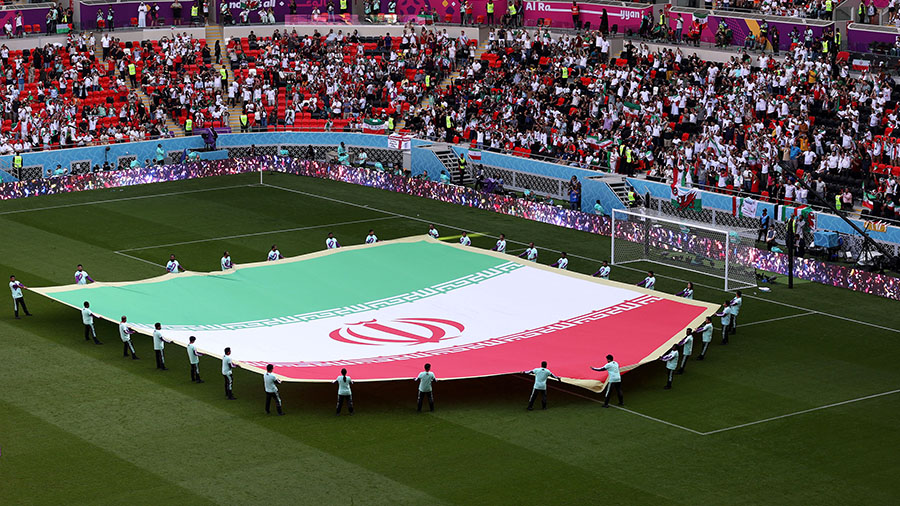 A giant flag of IR Iran on the pitch prior to the FIFA World Cup Qatar 2022 Group B match between W...
