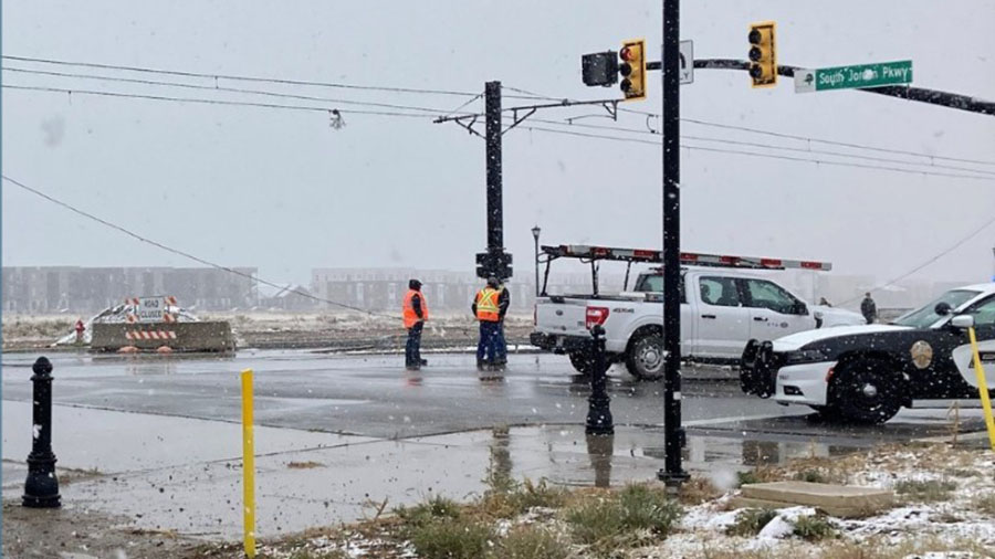 Road crews working on the downed power lines on South Jordan Parkway & Grandville Avenue. (South Jo...