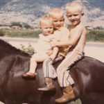 A family photo shows Trina Higgins (middle) atop a horse as a child in West Bountiful. (Credit: family photo)