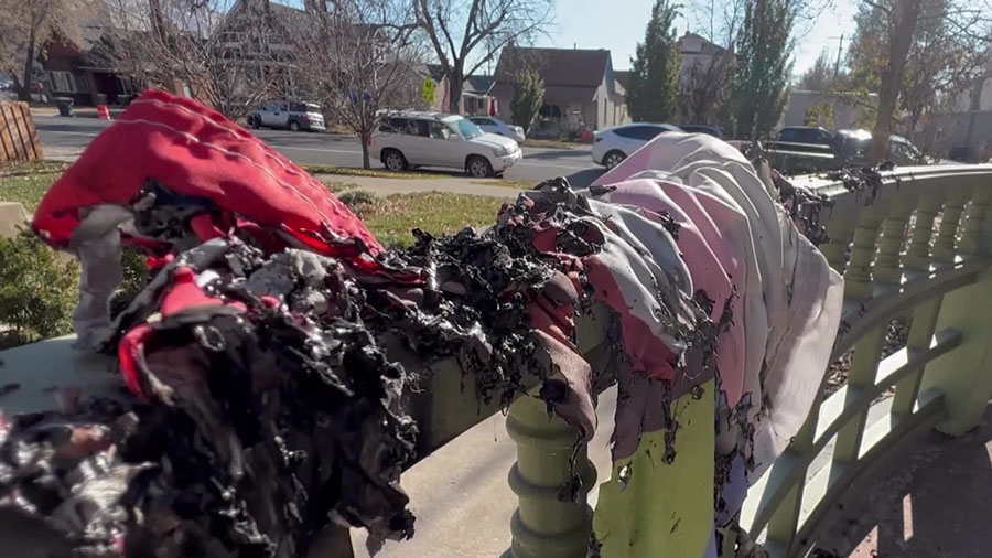 The burnt pride flag that was left outside one of the couple's home. (KSL-TV)...