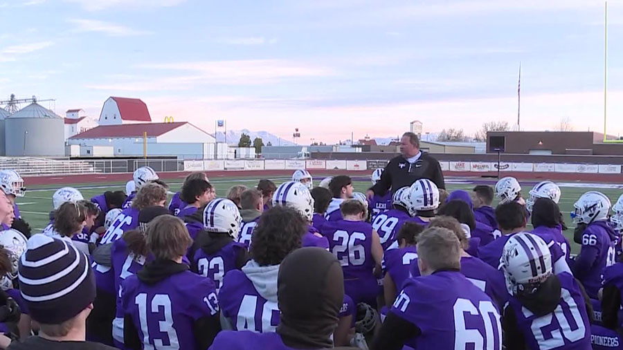 One of the two teams, Lehi High School's Lehi Pioneers, huddling during Thursday's practice. (KSL-T...