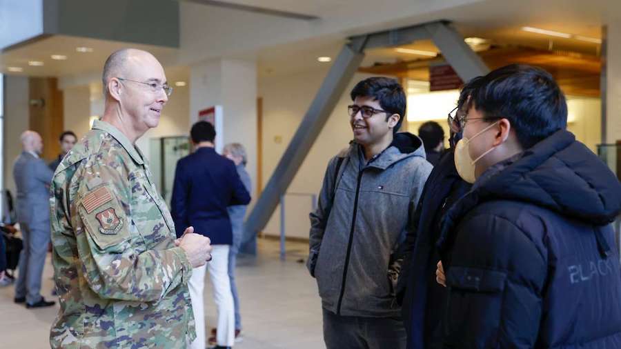 Brig. General Richard W. Gibbs speaks with students before a ceremony at the University of Utah whe...