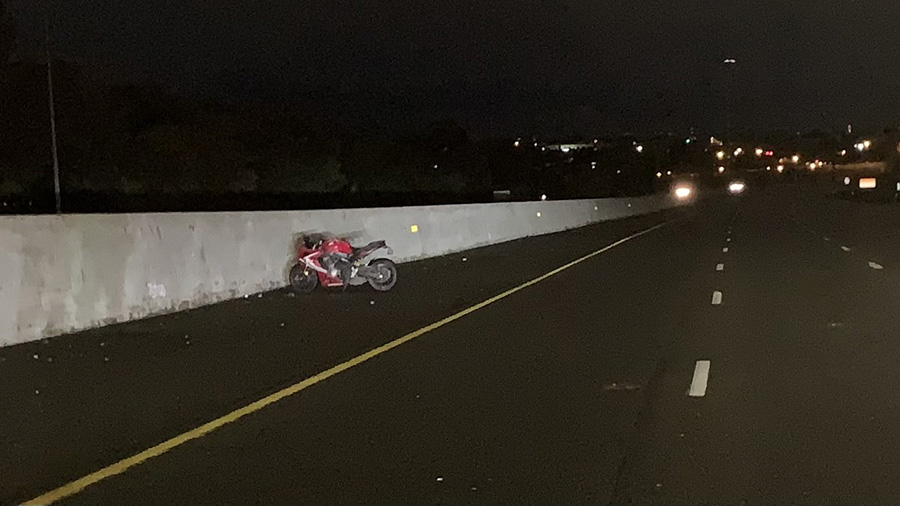 Motorcycle on the side of the freeway...