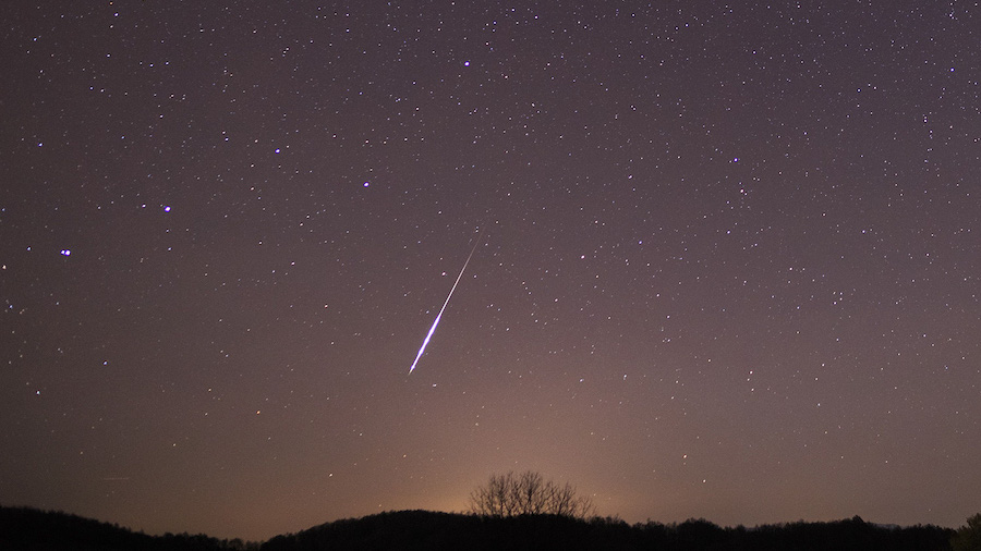 A bright fireball is seen above Brkini, Slovenia, on November 12, 2015, during a Taurid swarm. This...