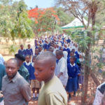 Children gathering for tree handover ceremony in Dodoma Tanzania 16 Nov 2022. (Intellectual Reserve, Inc.)