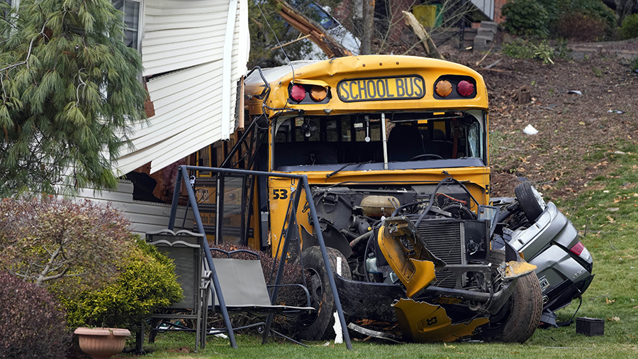 A school bus involved in an accident is seen in New Hempstead, N.Y., Thursday, Dec. 1, 2022. Multip...