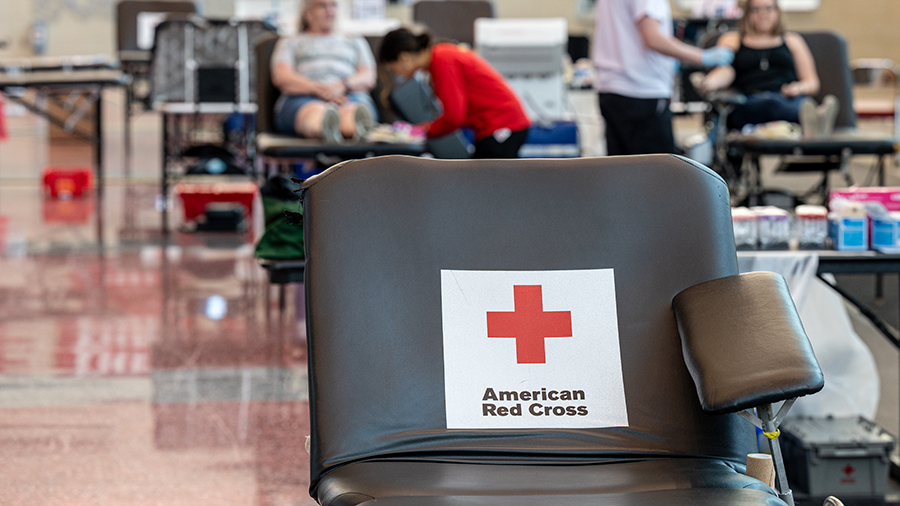 An empty donation table with the American Red Cross logo is seen in Louisville, Kentucky. The Ameri...