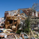 A heavily damaged home is seen in the Glenmary subdivision on April 14, 2022 in Louisville, Kentucky. Louisville's Mayor Greg Fischer declared a state of emergency in the city and Jefferson County Public Schools cancelled classes in response to the storm damage. (Photo by Jon Cherry/Getty Images)