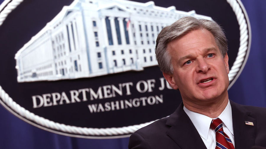 F.B.I. Director Christopher Wray speaks at a press conference at the U.S. Department of Justice on ...