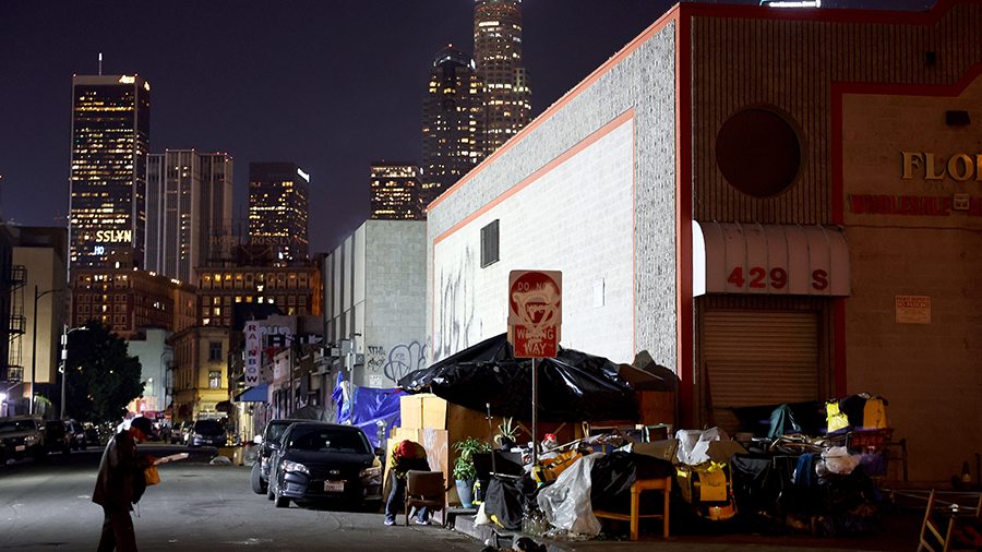 A homeless encampment lines a sidewalk in the Skid Row community on December 14, 2022 in Los Angele...