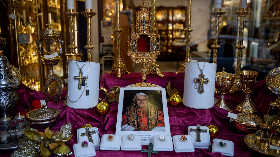A picture of Pope Benedict XVI is seen is seen in a shop following the announcement of the death of...