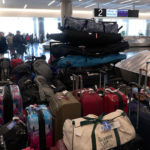Piles of Southwest Airlines customer baggage's waiting to return home. (KSL-TV Meghan Thackrey)  