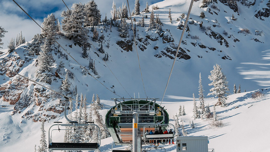 a ski lift is seen on a mountain at Snowbasin....