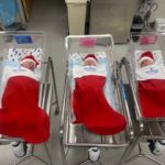 New babies pictured in Christmas stockings at Riverton Hospital. (Intermountain Healthcare)
