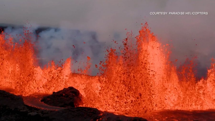 Mauna Loa spewing lava on Tuesday. (Courtesy: Paradise Helicopters via )...