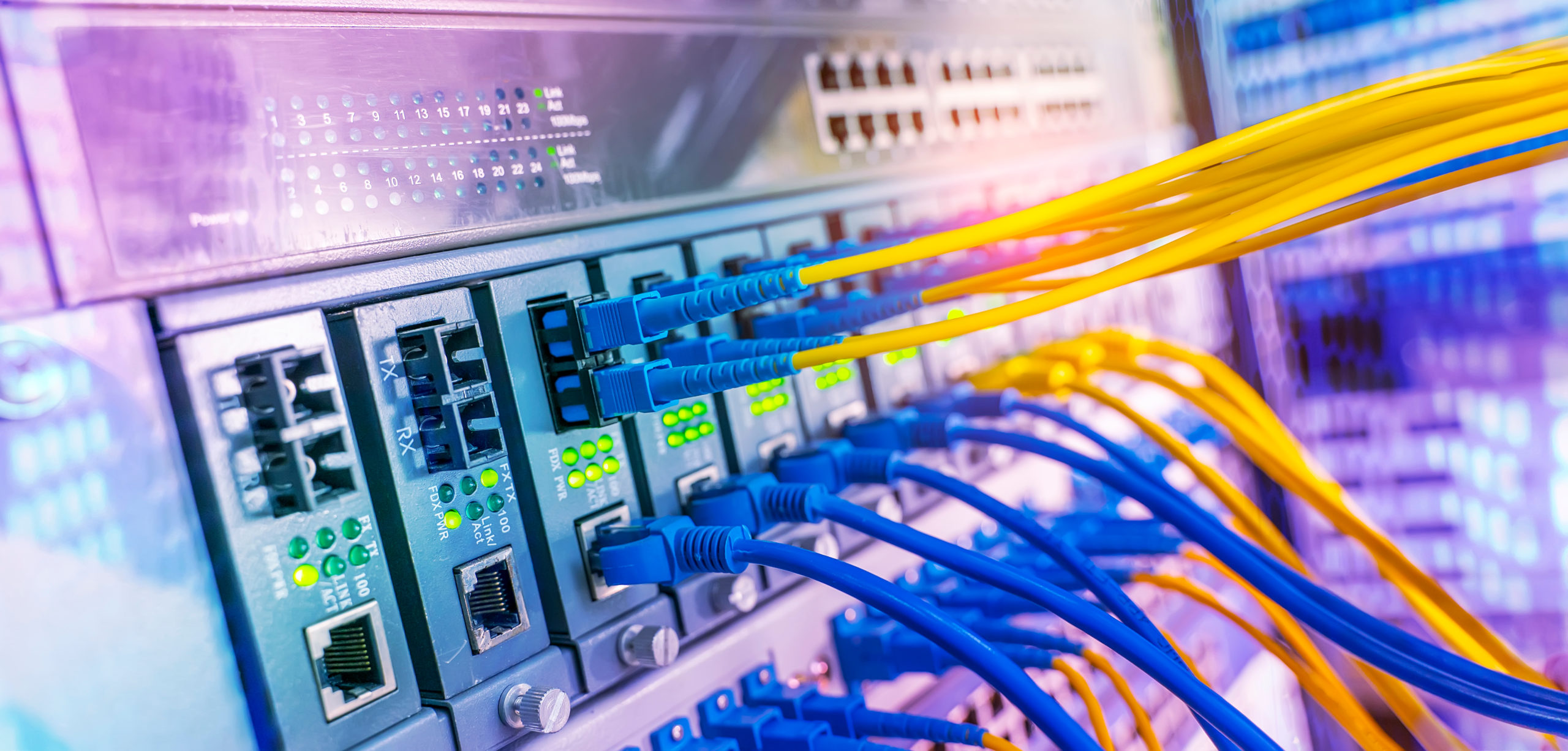 Fiber Optical cables connected to an optic ports and Network cables connected to ethernet ports...