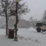 A Jeep drives across a snowy street in Evanston, Wyo. (Mark Wetzel, KSL TV)