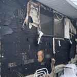 A family was displaced and two properties were damaged in a residential fire.