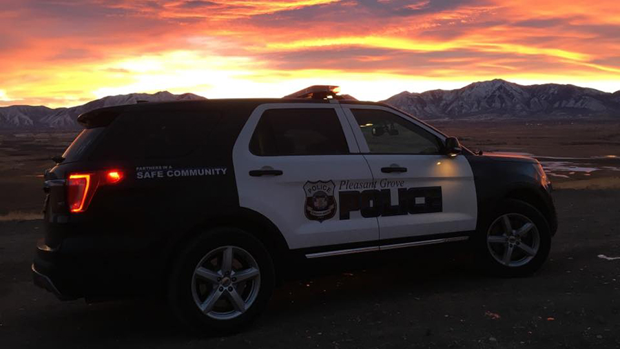 A Pleasant Grove police car is seen at sunset....