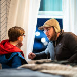 (L-R) Thomas Cummins as Young Calvin and Director Jake Van Wagoner on the set of the sci-fi/comedy, ALIENS ABDUCTED MY PARENTS AND NOW I FEEL KINDA LEFT OUT, a Jespers Comet Films, LLC release. (Steve Olpin and Jespers Comet Films, LLC.)
