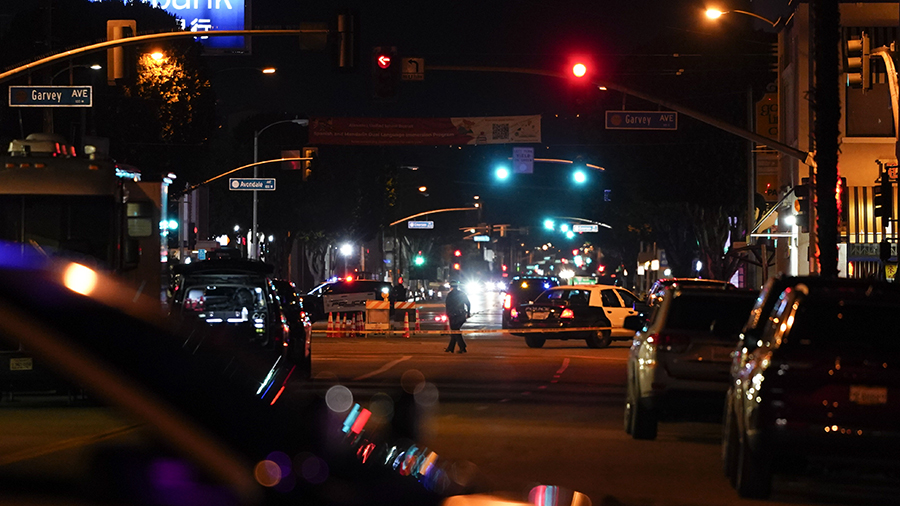Police investigate a scene where a shooting took place in Monterey Park, Calif., Sunday, Jan. 22, 2...