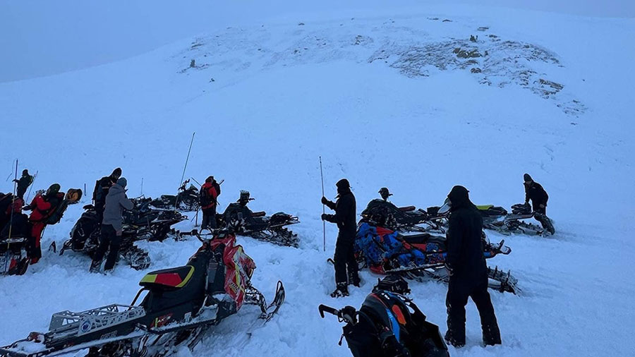 Recovery efforts will resume on Sunday for a missing snowmobiler who is believed to be buried in th...